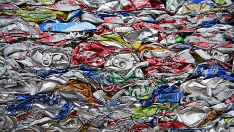 Aluminum cans crushed into a block